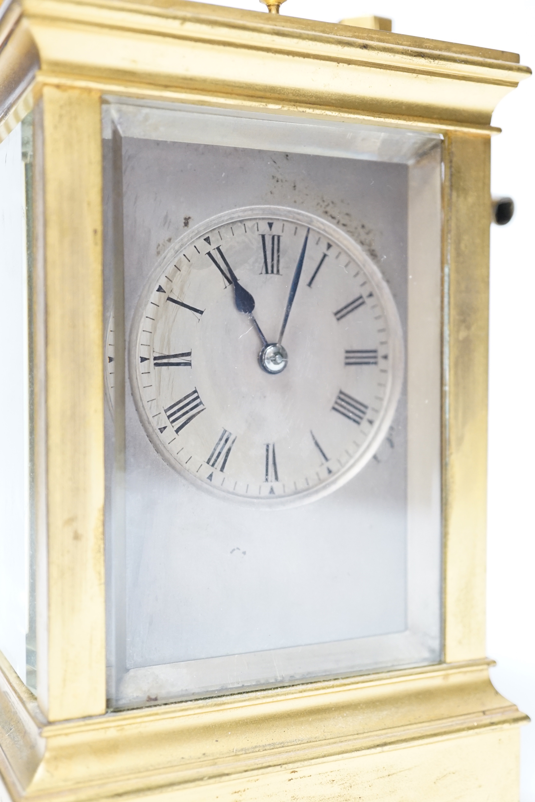 A late 19th century French gilt brass cased eight day repeating carriage clock with key, 17cm